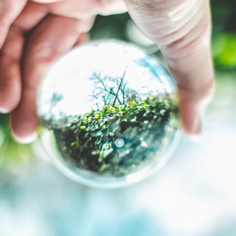 close-up-photo-of-person-holding-lensball-2534493-scaled-480x480